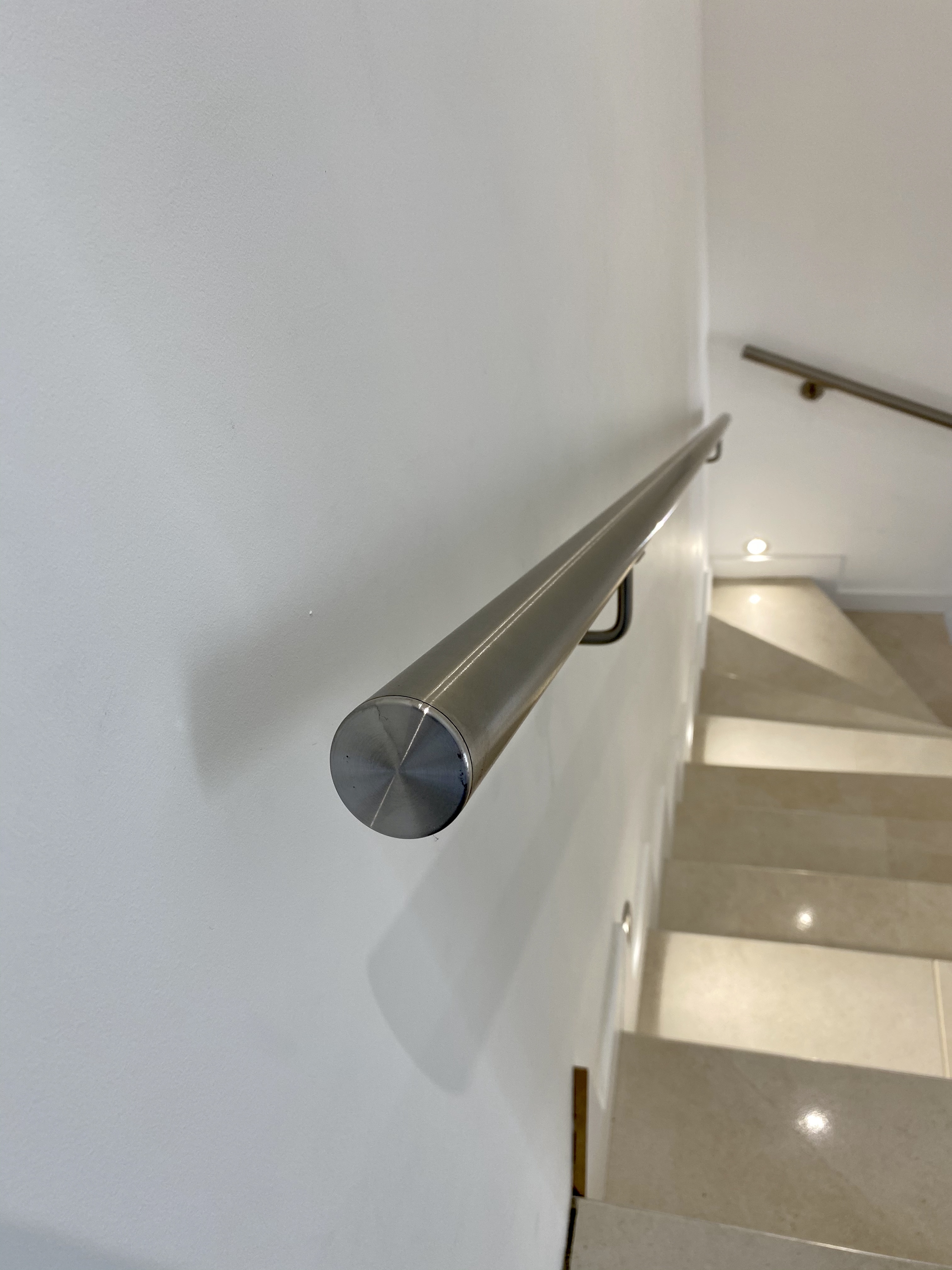 Main courante en inox pour un escalier