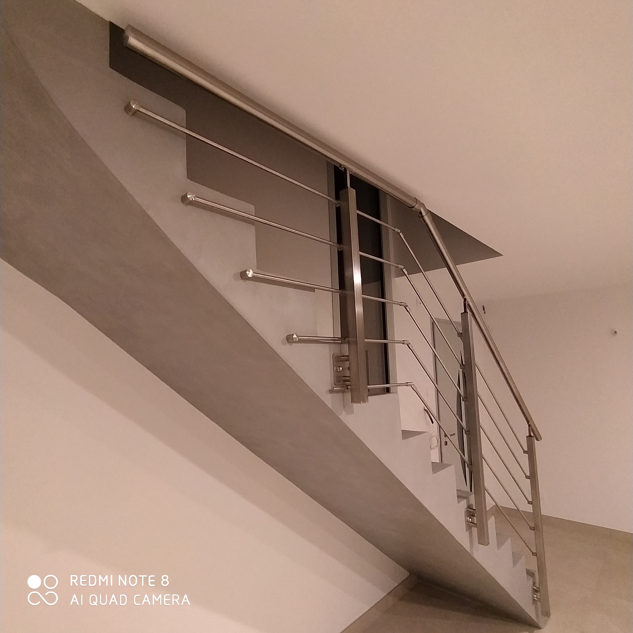 Protection d'un escalier avec un garde corps inox