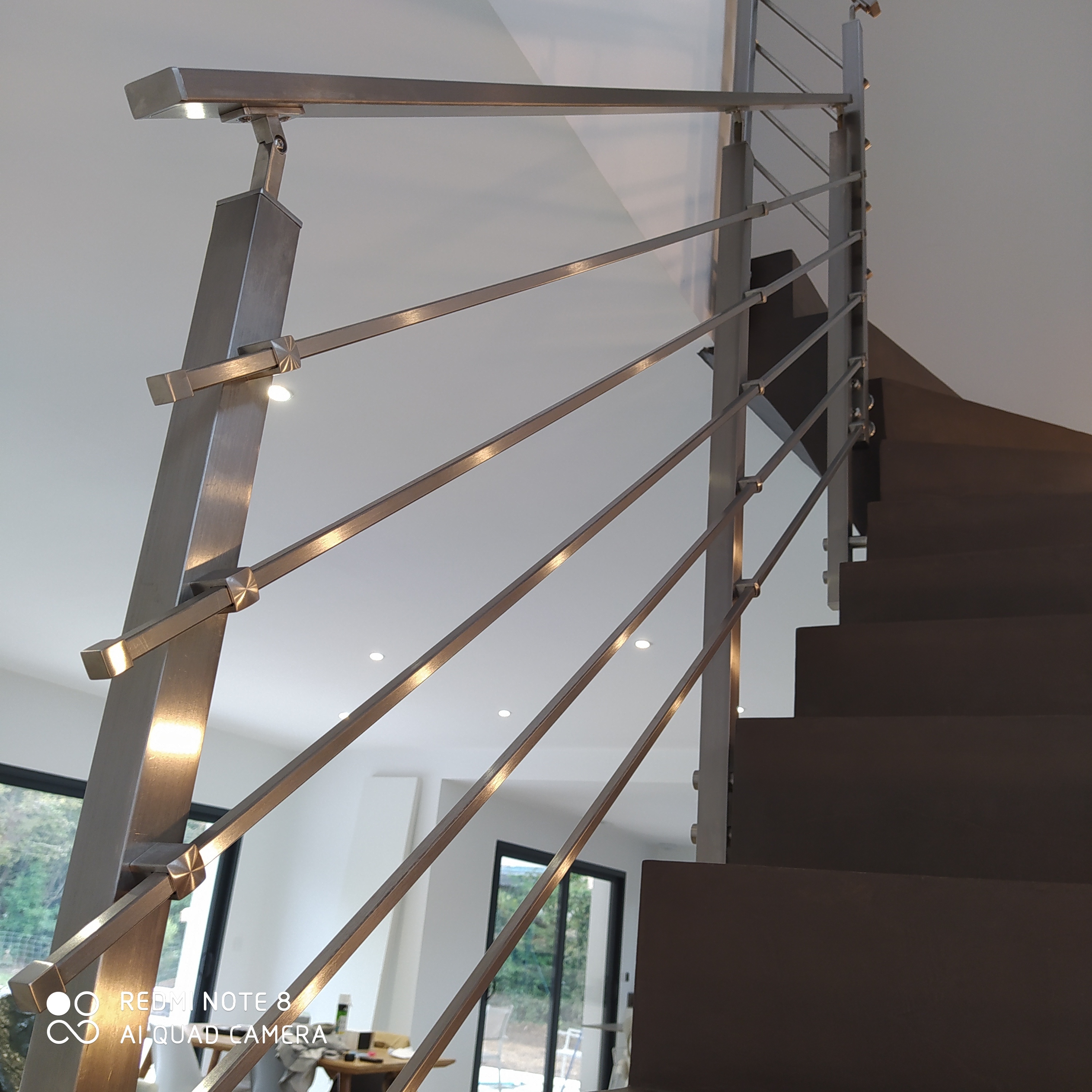Protection d'un escalier avec un garde corps inox