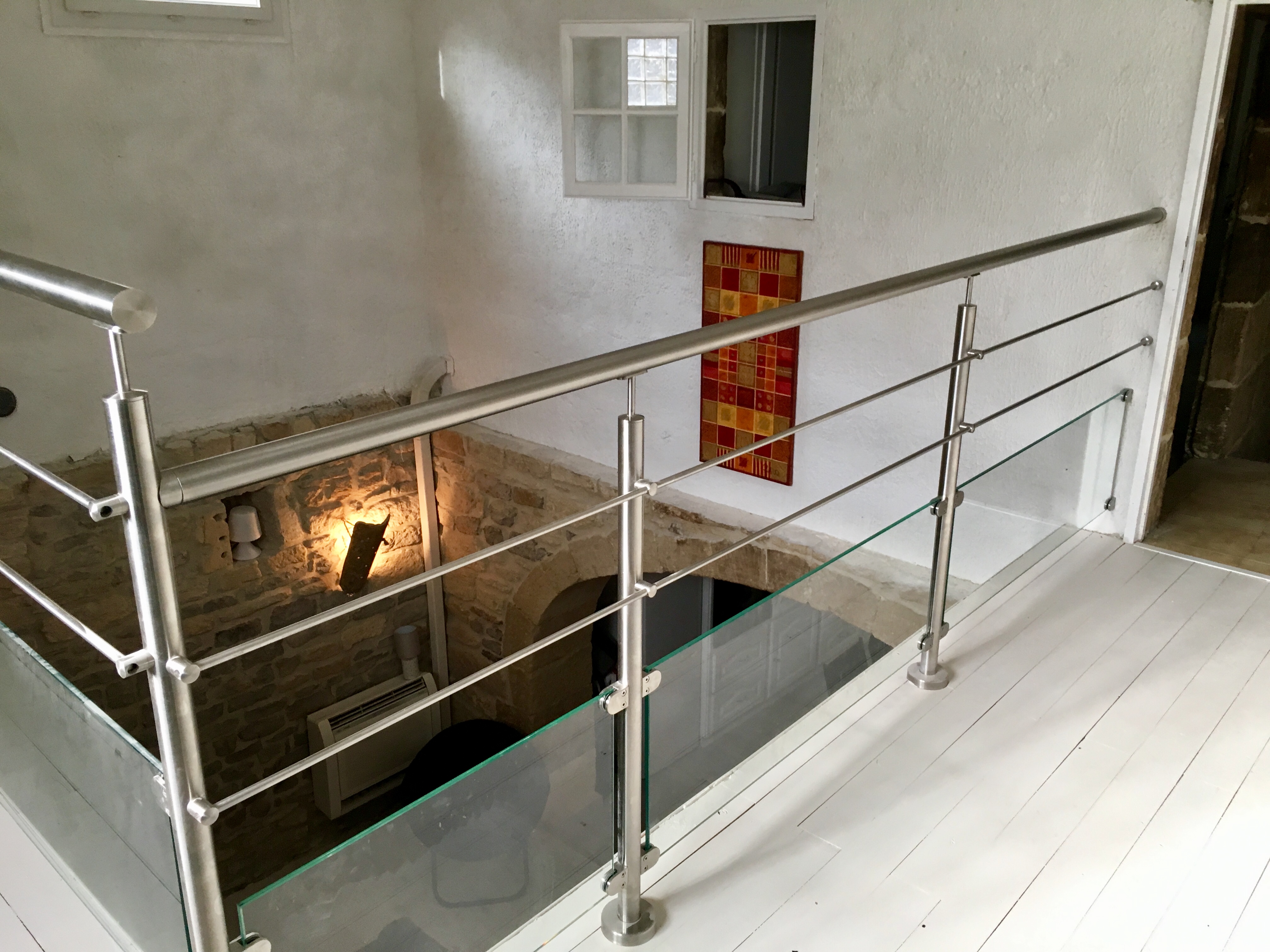 Garde corps en inox et verre d'une mezzanine